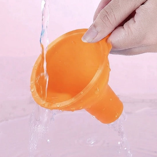 Entonnoir à confiture orange reprend naturellement sa forme