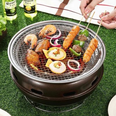 Barbecue-coreen-à-charbon-de-camp-beau-pratique