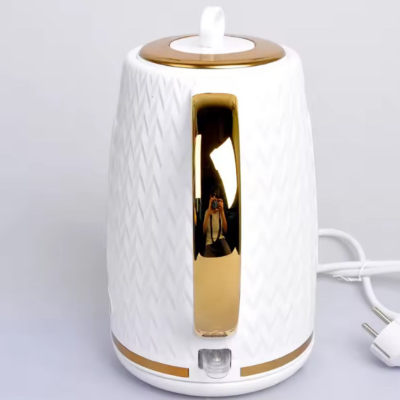 Bouilloire-électrique-doré-fond-outil-acier-finition-géométrique-zébré