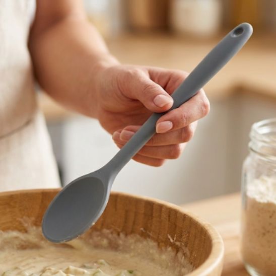 Cuillère gris manche ergonomique embout arrondi