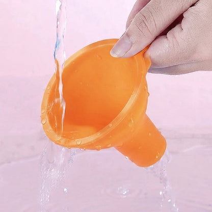 Entonnoir à confiture orange reprend naturellement sa forme