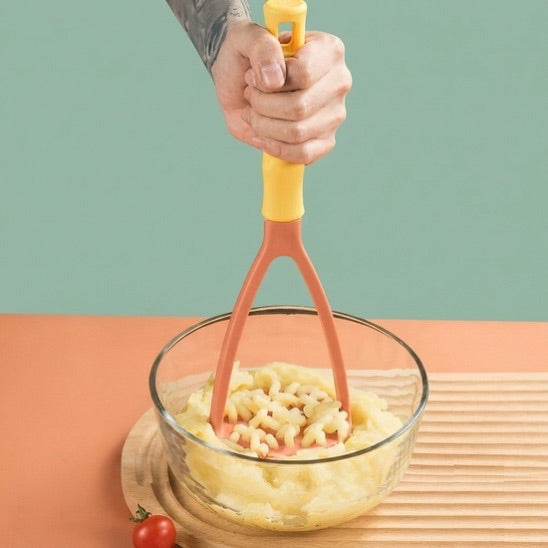 Presse purée écrase-légumes pratique brun clair jaune
