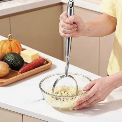 Presse purée poignée ergonomique