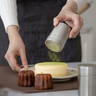 Tamis cacao sucre glace cannelle prise en main légère et pratique